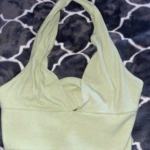 light green super soft very cropped halter top.